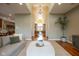 Hallway view with hardwood flooring, neutral decor, and arched entryways at 4890 Benthaven E Dr, Bargersville, IN 46106