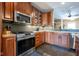 A kitchen featuring a gas range, stainless steel appliances, and backsplash at 4890 Benthaven E Dr, Bargersville, IN 46106