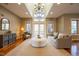Bright living room with large windows, hardwood floors, neutral decor, and ample natural light at 4890 Benthaven E Dr, Bargersville, IN 46106