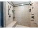 Modern shower with handheld and rainfall showerheads, tiled bench, and convenient storage at 4890 Benthaven E Dr, Bargersville, IN 46106