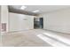 Spacious living room featuring neutral walls, plush carpet, and natural light at 5039 Five Points Rd, Indianapolis, IN 46239