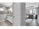 Stylish bathroom with dual vanity, a glass-enclosed shower, and sleek fixtures, conveniently located near bedroom at 5062 Foxley Park Ln, Avon, IN 46123