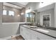 Elegant bathroom featuring a double sink vanity, modern fixtures, and glass-enclosed shower with stylish tile at 5062 Foxley Park Ln, Avon, IN 46123