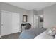 Comfortable bedroom featuring a desk, closet, and calming neutral color palette at 5062 Foxley Park Ln, Avon, IN 46123