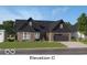 New construction home featuring a dark roof, brick exterior, and well-manicured lawn at 5062 Foxley Park Ln, Avon, IN 46123