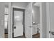 Laundry room with stackable washer/dryer near the bathroom at 5062 Foxley Park Ln, Avon, IN 46123