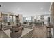 Open concept living area with lots of natural light, seamlessly connected to the kitchen at 5062 Foxley Park Ln, Avon, IN 46123