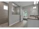 This spacious bathroom features a glass shower and double sink vanity at 5127 Foxley Park Ln, Avon, IN 46123