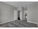 Neutral bedroom with open doorway to bath and walk-in closet at 5127 Foxley Park Ln, Avon, IN 46123