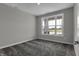 Bedroom with neutral walls, carpet, and a bright window at 5127 Foxley Park Ln, Avon, IN 46123