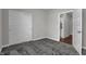Bedroom with neutral walls, carpet, and a closet at 5127 Foxley Park Ln, Avon, IN 46123