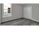Bedroom featuring neutral walls, carpet, and a bright window at 5127 Foxley Park Ln, Avon, IN 46123