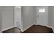 Bright entryway showcases the front door and durable flooring, seamlessly flowing into the adjacent living areas at 5127 Foxley Park Ln, Avon, IN 46123