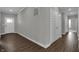 Inviting entryway featuring durable floors, fresh neutral paint, and convenient access to adjacent living spaces at 5127 Foxley Park Ln, Avon, IN 46123