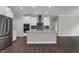 Kitchen with stainless steel appliances, double oven, and grey backsplash at 5127 Foxley Park Ln, Avon, IN 46123