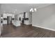 Modern kitchen with stainless steel appliances, an island, and ample white cabinets and counter space at 5127 Foxley Park Ln, Avon, IN 46123