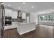 Modern kitchen equipped with stainless steel appliances and an expansive island, perfect for entertaining at 5127 Foxley Park Ln, Avon, IN 46123