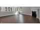 Living room with luxury vinyl flooring and fireplace at 5127 Foxley Park Ln, Avon, IN 46123