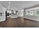 Open concept: kitchen flows into the living space, providing an airy feel at 5127 Foxley Park Ln, Avon, IN 46123
