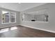 Living space with ample natural light and an open view to other rooms at 5127 Foxley Park Ln, Avon, IN 46123