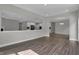 Open-concept floorplan showcases seamless transition between living, dining, and kitchen areas at 5127 Foxley Park Ln, Avon, IN 46123