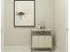 Bright laundry room area featuring storage cart, jars, and a framed painting at 5208 Foxley Park Ln, Avon, IN 46123