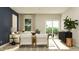 Spacious living room with plenty of natural light, comfortable seating, and a sliding door to the outside at 5208 Foxley Park Ln, Avon, IN 46123