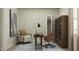 Well-lit home office setup with modern furnishings and calming blue rug at 5208 Foxley Park Ln, Avon, IN 46123