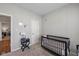 Bedroom with crib, side table with lamp, and minimal decor on neutral walls at 5375 Citadel Dr, Noblesville, IN 46062