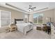 Comfortable main bedroom featuring a tray ceiling, ceiling fan, and neutral carpeting at 5375 Citadel Dr, Noblesville, IN 46062