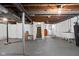Spacious unfinished basement with concrete floor, utility sink and washer/dryer hookups at 5439 Indianola Ave, Indianapolis, IN 46220