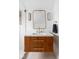 Bathroom with vanity, custom mirror, and modern fixtures at 5439 Indianola Ave, Indianapolis, IN 46220