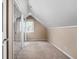 Bedroom with mirrored closet doors and a window at 5439 Indianola Ave, Indianapolis, IN 46220