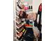 Closet featuring adjustable shoe rack shelves and extra space for shoes, boxes, and accessories at 5507 Wakefield Rd, Greenwood, IN 46142