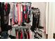 Well-organized walk-in closet featuring ample hanging space, shelving, and room for shoes and accessories at 5507 Wakefield Rd, Greenwood, IN 46142