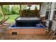 Relax in this inviting backyard hot tub on the deck, perfect for entertaining or unwinding at 5507 Wakefield Rd, Greenwood, IN 46142