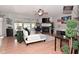 Open-concept living room featuring a cozy fireplace, stylish furnishings, and ample natural light at 5507 Wakefield Rd, Greenwood, IN 46142