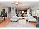 Spacious living room featuring stylish decor, comfortable seating, and an open layout at 5507 Wakefield Rd, Greenwood, IN 46142