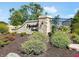 Welcome to Edgewood Farms stone entrance, with beautiful landscaping and signage at 5547 Tart Blvd, Indianapolis, IN 46239