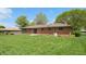 Spacious backyard with well-maintained grass, ideal for outdoor activities at 5683 Steven Dr, Greenwood, IN 46142