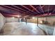 Spacious unfinished basement with exposed beams and concrete floor, ready for customization at 5683 Steven Dr, Greenwood, IN 46142