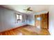 Bedroom with hardwood floors, ceiling fan, and a closet at 5683 Steven Dr, Greenwood, IN 46142