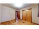 Spacious bedroom with hardwood floors and closet at 5683 Steven Dr, Greenwood, IN 46142