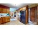 Well-organized kitchen showcasing wood cabinets, appliances, and an eat-in breakfast nook at 5683 Steven Dr, Greenwood, IN 46142