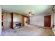 Cozy living room featuring a brick fireplace and lots of natural light at 5683 Steven Dr, Greenwood, IN 46142