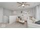Cozy living room boasts neutral tones, stylish furnishings, modern lighting, and comfortable seating at 5784 Summertree Pl, Whitestown, IN 46052