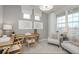 Inviting office with two desks, two chairs, two sofas and lots of light from large windows at 5784 Summertree Pl, Whitestown, IN 46052