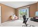 Bedroom with access to balcony featuring natural light and a work space at 582 Conner Creek Dr, Fishers, IN 46038
