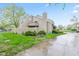 Exterior view of home with a fenced in yard and luscious green foliage at 582 Conner Creek Dr, Fishers, IN 46038