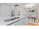 Open-concept kitchen with a view of the dining area and living room, fostering a welcoming atmosphere at 582 Conner Creek Dr, Fishers, IN 46038